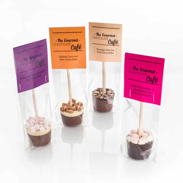 Different flavour hot chocolate stirrers in a line